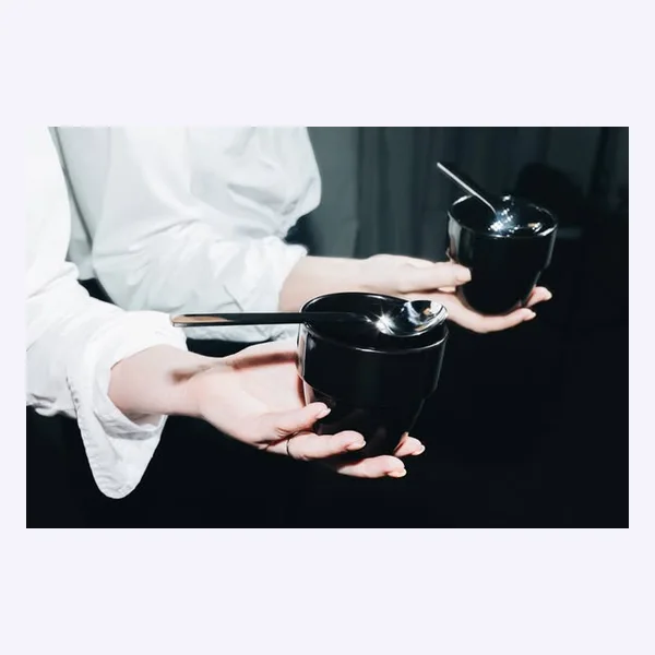 Static Meta ad: hands holding a coffee grinder