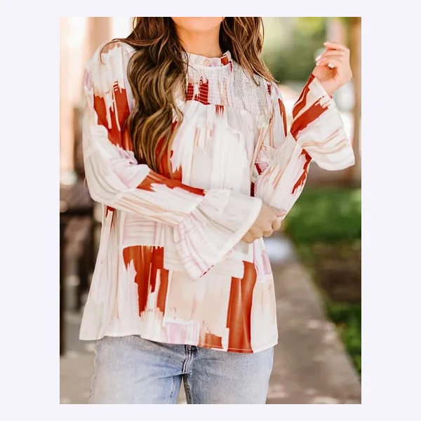Static Meta ad: a printed blouse worn on the street