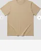 The Basic design's photo gallery, a sand T-shirt on a pale grey background