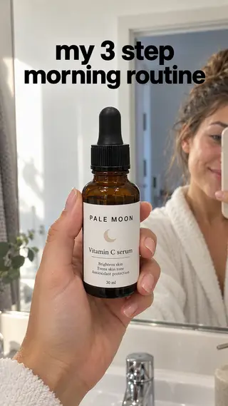 Instagram Story with "my 3 step morning routine" written across it: a woman holding the Pale Moon serum bottle up to her bathroom mirror in the morning
